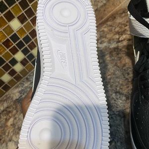 Never wore high top nikes paper still inside shoe.